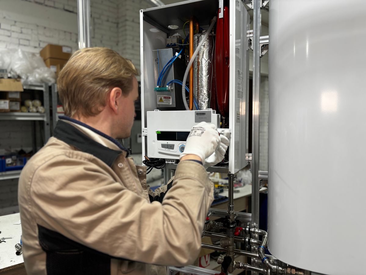Certified technician servicing a home appliance